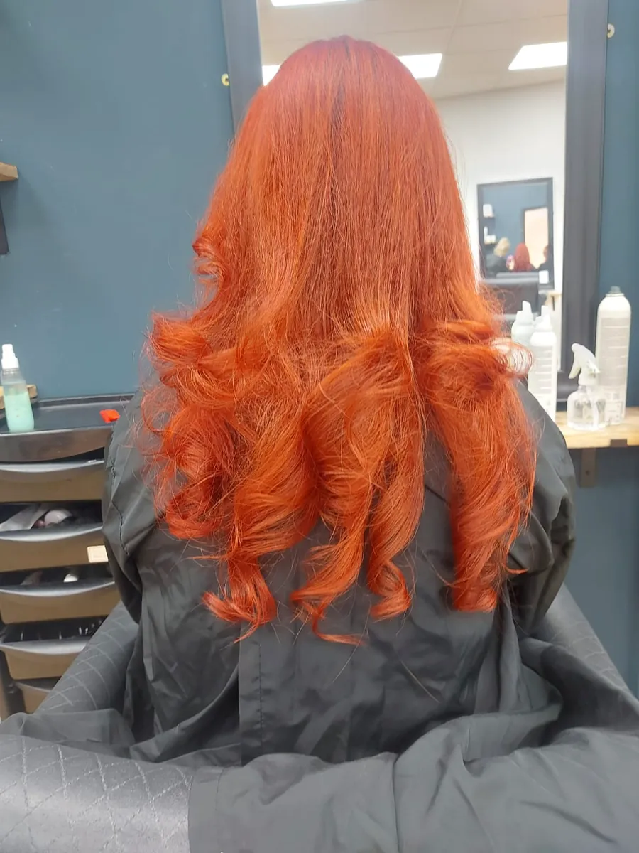 Glamorous copper curls for a special occasion